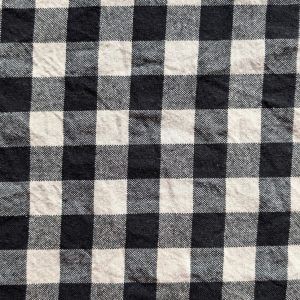 Toile de coton tissé teint noir et beige à carreaux