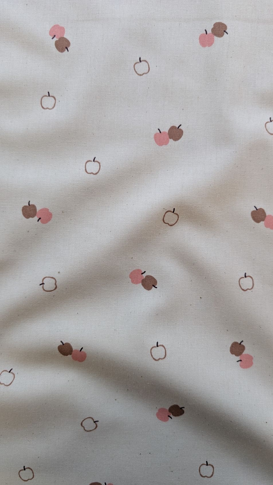 Tissu popeline écru motif pommes